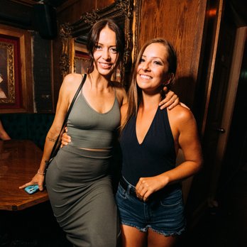 Happy Fish - two women posing for a picture - Cocktail Bars Near Me - Ottawa, Ontario Happy Fish - two women posing for a picture - Cocktail Bars Near Me - Ottawa, Ontario