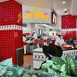 ows a kitchen with red tiles ows a kitchen with red tiles