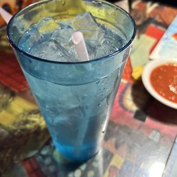 a glass of water with ice and a straw a glass of water with ice and a straw