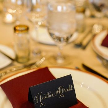 Menakshee Designs - Gold ink on navy placecards. Photo courtesy of @retrospectimages - Calligraphy Near Me Menakshee Designs - Gold ink on navy placecards. Photo courtesy of @retrospectimages - Calligraphy Near Me