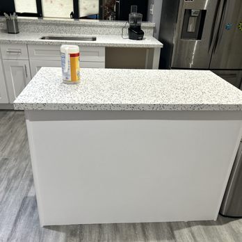 LM TILE - a kitchen counter with a can of soda on it - Flooring Near Me - Houston, Texas LM TILE - a kitchen counter with a can of soda on it - Flooring Near Me - Houston, Texas