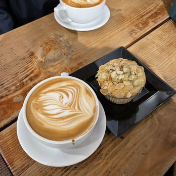 Kuppa Joy Coffee House - Almond joy coffee, almond poppyseed muffin and a Hallelujah coffee - Coffee & Tea Near Me - Clovis, California Kuppa Joy Coffee House - Almond joy coffee, almond poppyseed muffin and a Hallelujah coffee - Coffee & Tea Near Me - Clovis, California