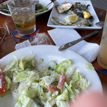 Eagle Grille and Millers Dockside - Oysters Rockefeller and salad - Seafood Near Me - Boca Grande, Florida Eagle Grille and Millers Dockside - Oysters Rockefeller and salad - Seafood Near Me - Boca Grande, Florida