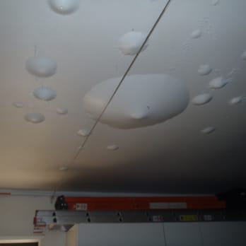 Servpro - This is what happens when water is trapped in the ceiling by latex paint - Damage Restoration Near Me - Santa Ana, California Servpro - This is what happens when water is trapped in the ceiling by latex paint - Damage Restoration Near Me - Santa Ana, California