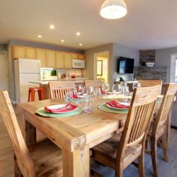 Killington Center Inn & Suites - Dining table and kitchen island in our suites.