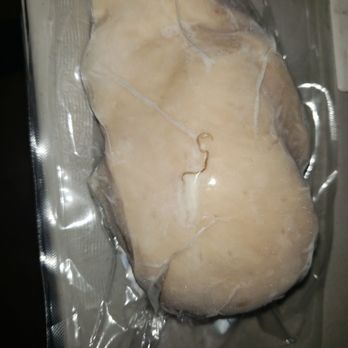 Costco - That looks like worm coming out of the chicken breast... how the hell did this make it into the packaging?! That's disgusting af! - Wholesale Stores Near Me - Alhambra, California
