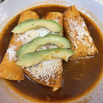 Ollin Restaurant - Birria Enchiladas + Consome topped with avocado and cheese - Mexican Near Me - New York, New York Ollin Restaurant - Birria Enchiladas + Consome topped with avocado and cheese - Mexican Near Me - New York, New York