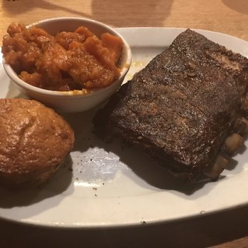 Redsmoke Barbeque - Half-rack ribs (delicious) with Candied Sweet Potatoes and Jalapeno Cheddar Corn Muffin which was cold and tough. - Bars Near Me - Detroit, Michigan Redsmoke Barbeque - Half-rack ribs (delicious) with Candied Sweet Potatoes and Jalapeno Cheddar Corn Muffin which was cold and tough. - Bars Near Me - Detroit, Michigan