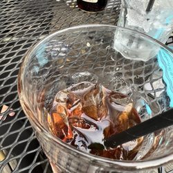 Bits of food stuck to side of glass