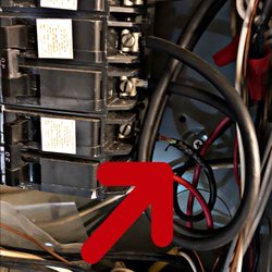 Working Dog Home Inspection - Overheated wire in the main panel.