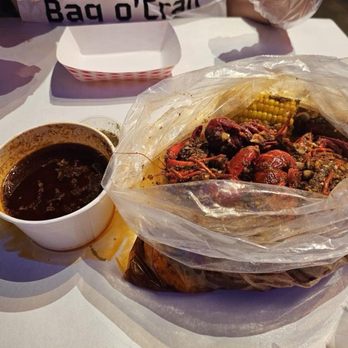 Bag O' Crab - Combo 1 - 1lb crawfish and 1lb shrimp with corn, potatoes and sausages. Extra side on the sauce - Cajun/Creole Near Me - Fullerton, California Bag O' Crab - Combo 1 - 1lb crawfish and 1lb shrimp with corn, potatoes and sausages. Extra side on the sauce - Cajun/Creole Near Me - Fullerton, California