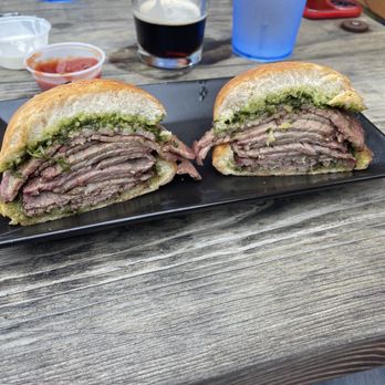 The Wilds Taphouse & BBQ - Tri tip sandwich.  We ate the fries..... - Barbeque Near Me - Newport, Oregon