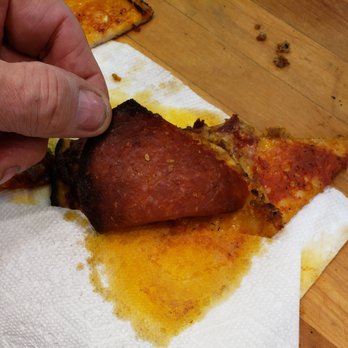 Redhead Lakeside Grill - Bottom towel after press, yikes, this is after the box soaked up some grease - Pizza Near Me - Osage Beach, Missouri Redhead Lakeside Grill - Bottom towel after press, yikes, this is after the box soaked up some grease - Pizza Near Me - Osage Beach, Missouri