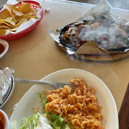 a plate of mexican food on a table
