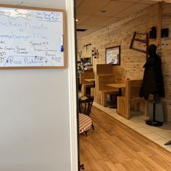 The Homestead Deli & Bakery - The central half has tables and booths.