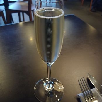 Table 128 - A bit of sparkling wine to kick off the long weekend. - New American Near Me - Des Moines, Iowa