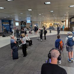 Piedmont Triad International Airport - GSO - Landside, baggage claim and rental cars (lower level, arrivals). View just before leaving the downward escalators.