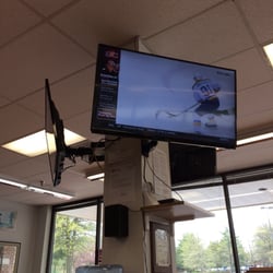 Warren's Barber Shop - Several Big Screens