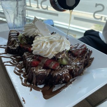 Pannes - banana bread french toast with fruit. - Breakfast & Brunch Near Me - San Juan, Puerto Rico Pannes - banana bread french toast with fruit. - Breakfast & Brunch Near Me - San Juan, Puerto Rico