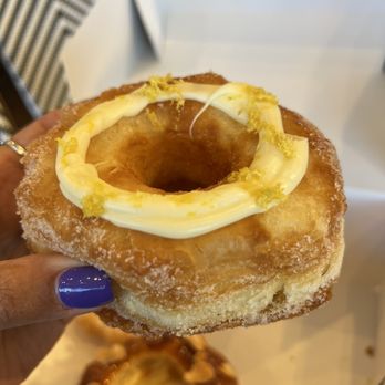 Paris Baguette - Croissant Donut - filled with Vanilla Bavarian cream and lemon icing. - Bakeries Near Me - Parker, Colorado Paris Baguette - Croissant Donut - filled with Vanilla Bavarian cream and lemon icing. - Bakeries Near Me - Parker, Colorado