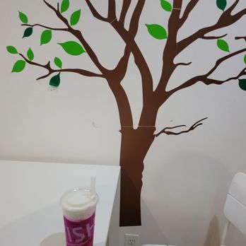Mr.Wish - a coffee cup on a table next to a tree - Juice Bars & Smoothies Near Me - Great Neck, New York Mr.Wish - a coffee cup on a table next to a tree - Juice Bars & Smoothies Near Me - Great Neck, New York