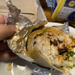 Gigantic ass tear in my burrito. Thought it was salvageable until the whole thing fell apart. Pure laziness.