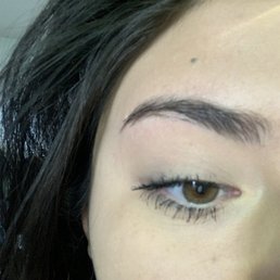 Waxed eyebrow from assistant manager