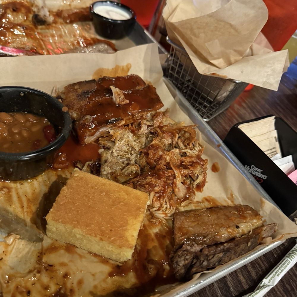 Enzo's BBQ & Alehouse - Southern Combo with a side of hush puppies - Barbeque Near Me - Oceanside, California Enzo's BBQ & Alehouse - Southern Combo with a side of hush puppies - Barbeque Near Me - Oceanside, California