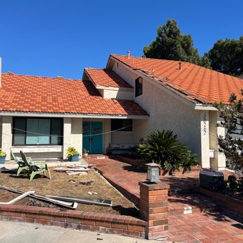 Genuine Coatings - Before with White Gutters, Fascia and Eaves, mis-matched pattern of clay tiles. - Painters Near Me Genuine Coatings - Before with White Gutters, Fascia and Eaves, mis-matched pattern of clay tiles. - Painters Near Me
