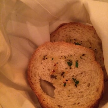 Osteria Rustica - Homemade garlic bread served with every meal. - Italian Near Me - Bunnell, Florida Osteria Rustica - Homemade garlic bread served with every meal. - Italian Near Me - Bunnell, Florida