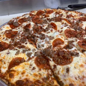 Double-O Saloon - We have a variety of pizzas! - American Near Me - Monroe Center, Illinois