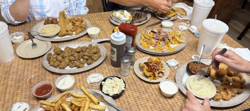 Akins Bar-B Q & Grill Logo