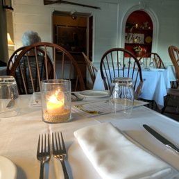 a table setting with a candle