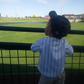 Sloan Park - My son checking out the lawn seats. - Stadiums & Arenas Near Me - Mesa, Arizona Sloan Park - My son checking out the lawn seats. - Stadiums & Arenas Near Me - Mesa, Arizona