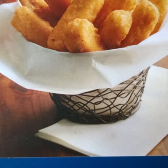 Greg's Place - Mozzarella sticks photo on table. - New American Near Me - Orlando, Florida