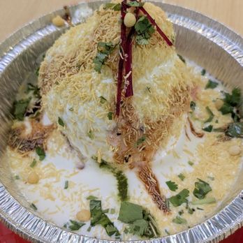 Bikanervala - Raj Kachori - Fried hollow ball filled with lentils and potatoes , topped with yogurt, sweet tamarind sauce, green cilantro sauce - Indian Near Me - Fremont, California Bikanervala - Raj Kachori - Fried hollow ball filled with lentils and potatoes , topped with yogurt, sweet tamarind sauce, green cilantro sauce - Indian Near Me - Fremont, California