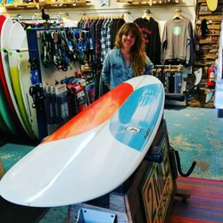 2 Mile Surf Shop - Jen getting her first new board. 8.0' Mystic Egg.