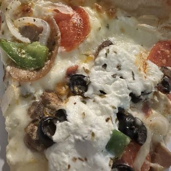 A Touch Of Basil - Ricotta on top of all the supreme toppings - Italian Near Me - Cocoa Beach, Florida