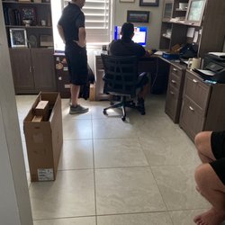 Best Buy - Fort Myers - Techs working on our new computer