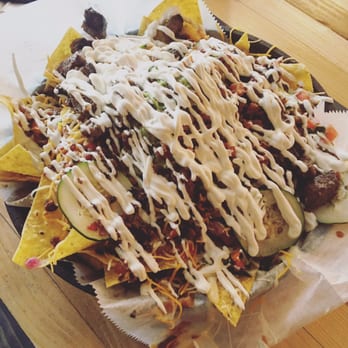 Cantina Fresh Mex Grill - Steak nachos topped w/ sour cream-- HUGE PORTION! - Tex-Mex Near Me - Hialeah, Florida Cantina Fresh Mex Grill - Steak nachos topped w/ sour cream-- HUGE PORTION! - Tex-Mex Near Me - Hialeah, Florida