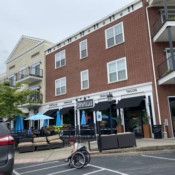 Sopapilla's - a man riding a bike in front of a restaurant - Mexican Near Me - Franklin, Tennessee Sopapilla's - a man riding a bike in front of a restaurant - Mexican Near Me - Franklin, Tennessee
