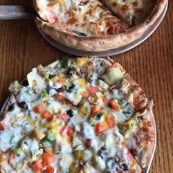 Donnies Homespun Pizza - Dank veggie (artichoke, green peppers, olives, tomatoes, the works!) and 3 cheese spinach artichoke