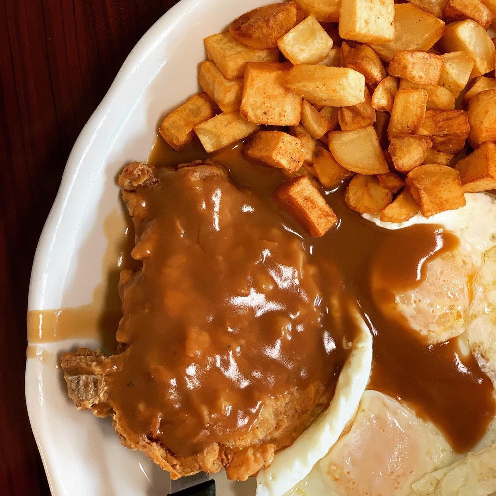 Breakfast & Lunch Lovers - Pork chop with brown gravy, 2 eggs over easy and seasoned potatoes - Desserts Near Me - Raytown, Missouri Breakfast & Lunch Lovers - Pork chop with brown gravy, 2 eggs over easy and seasoned potatoes - Desserts Near Me - Raytown, Missouri
