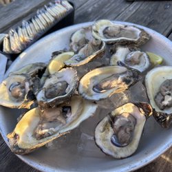 Pink Pony Pub - Dozen oysters....with plenty of cracked shells in them and dirt.
