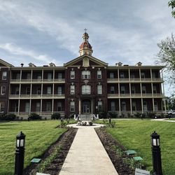 Tobias Ryan, PsyD - Front of the Academy Building.