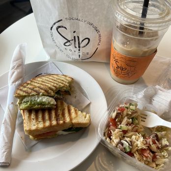 SIP Coffee - Mozzarella pesto, Panini, Greek orzo, and a cold brew - Coffee & Tea Near Me - Toledo, Ohio SIP Coffee - Mozzarella pesto, Panini, Greek orzo, and a cold brew - Coffee & Tea Near Me - Toledo, Ohio