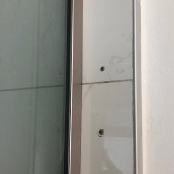 Adams Custom Cabinetry - more holes in brand new tile from incorrect install - Cabinetry Near Me - Lakewood, Colorado