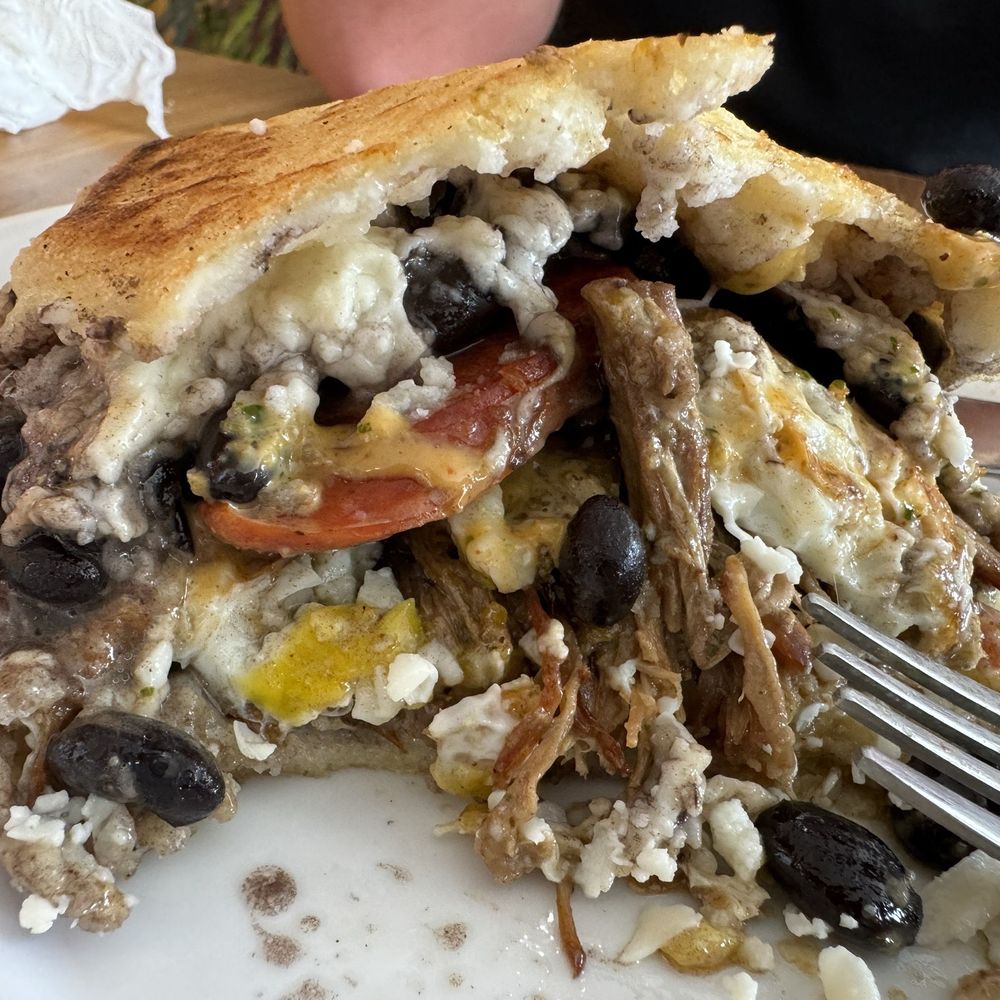 1Chick 1Bro Cafe Bistro - #11 with shredded beef and chorizo. DELISH - Venezuelan Near Me - Gulfport, Florida