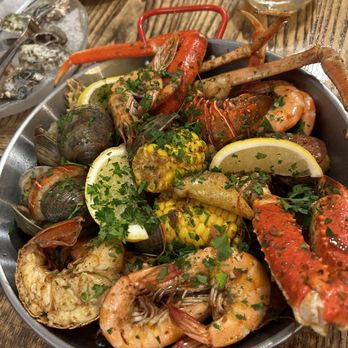 Driftwood - Royalty seafood boil with driftwood special sauce - Seafood Near Me - Maspeth, New York Driftwood - Royalty seafood boil with driftwood special sauce - Seafood Near Me - Maspeth, New York