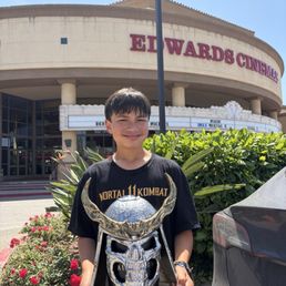 My son with his special show popcorn holder My son with his special show popcorn holder